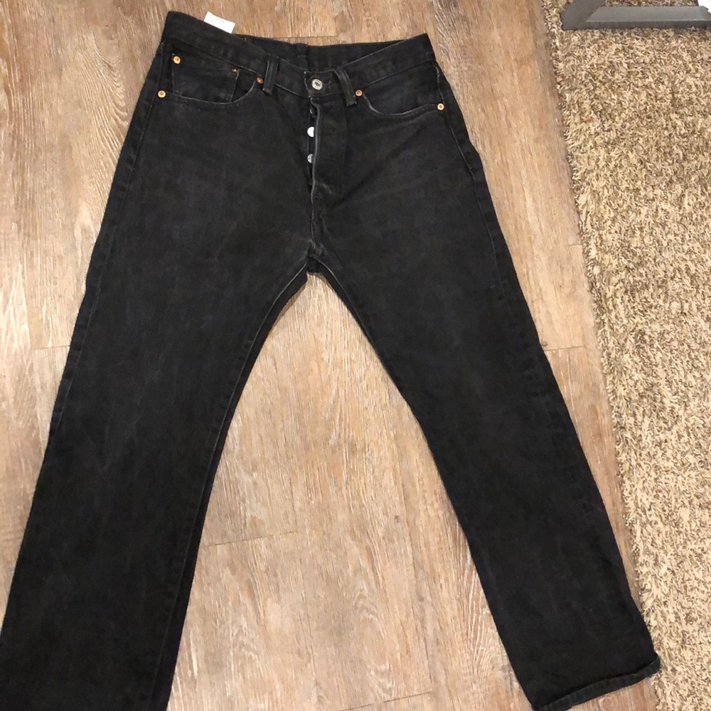Faded black Levi 501s